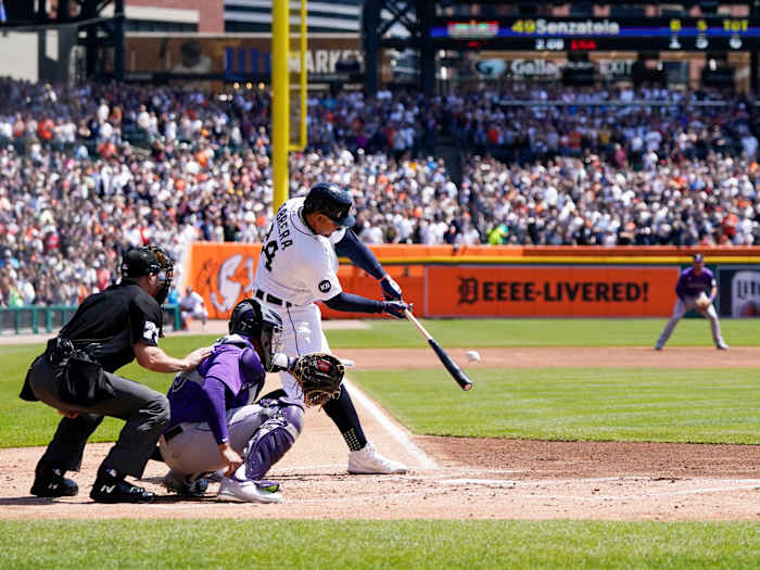 Detroit Tigers designated hitter Miguel Cabrera connects for his 3,000th hit during the first inning of the first baseball game of a doubleheader against the Colorado Rockies, Saturday, April 23, 2022, in Detroit.
